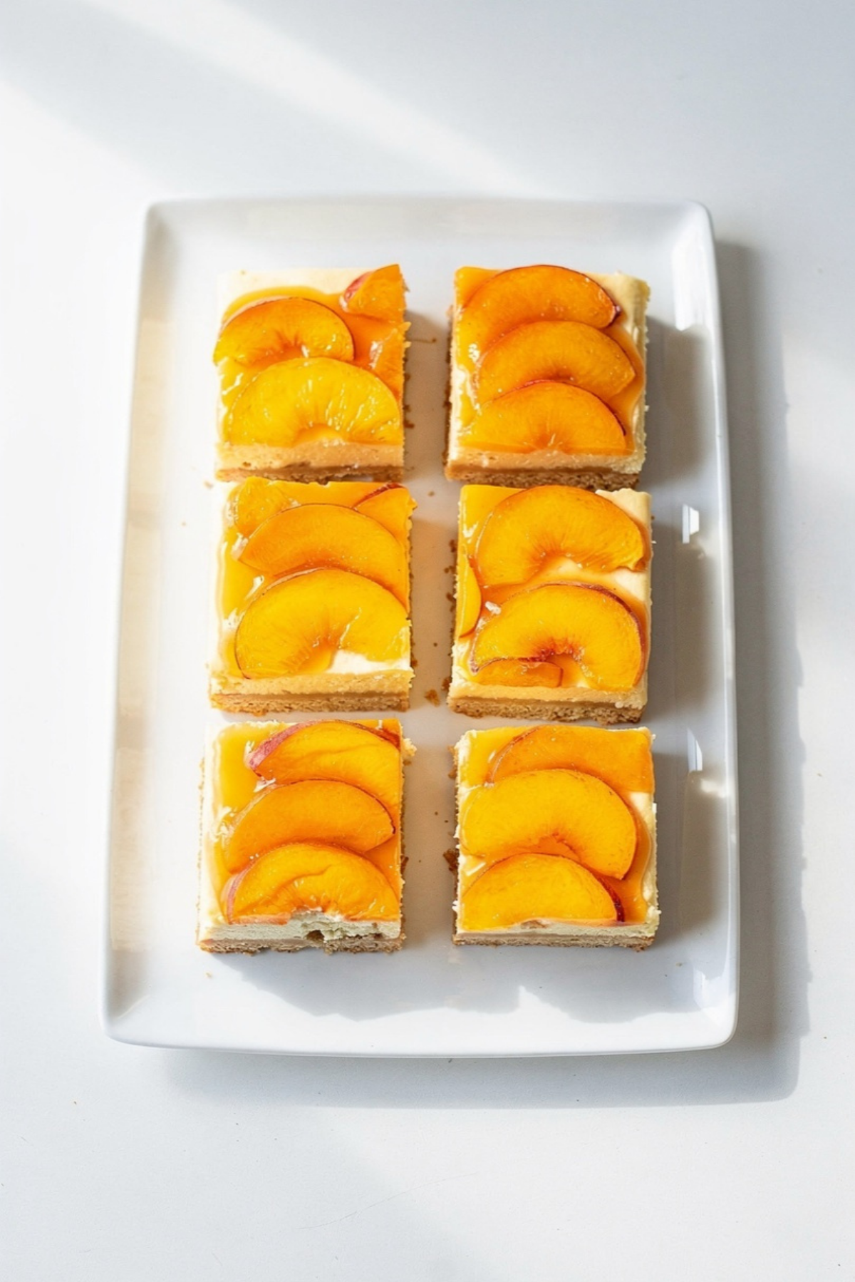 Peaches and Cream Cheesecake Bars