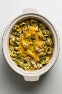 Slow Cooker Tortellini Casserole with Cheesy Chicken & Pesto